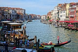 Gondoliers Plying the Grand Canal in Venice