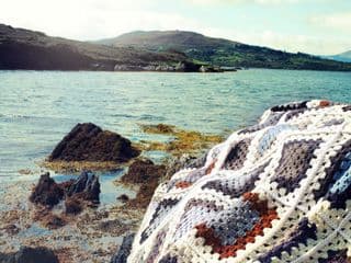 Crocheted Granny Square Blanket by the Shore