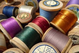 Assorted Wooden Spools of Sewing Thread