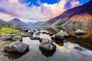 Rocks in Wastwater Reflect the Majestic Mountains
