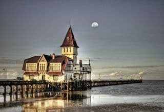 Moonlit Pier House by the Sea