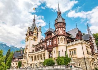 Regal Peles Castle amidst the Carpathian Mountains
