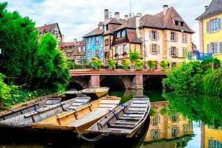 Traditional Boats Moored Along the Colmar Canals
