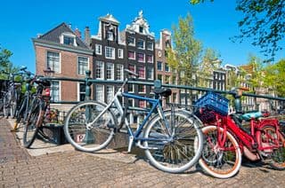 Amsterdam Bicycles against Dutch Architecture