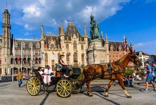 Horse-drawn Carriage in the Heart of Bruges