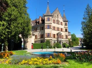 Elegant Seeburg Castle amidst Blooming Gardens