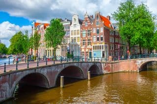 Amsterdam's Iconic Bridges Over Historic Canals