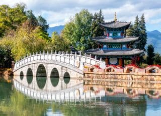 Arched Bridge Reflecting in Jade Spring Park, Lijiang
