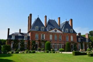 Elegant French Chateau amidst Vibrant Gardens