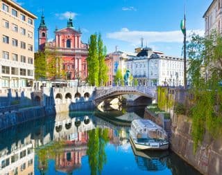 Triple Bridge Reflection in Ljubljana