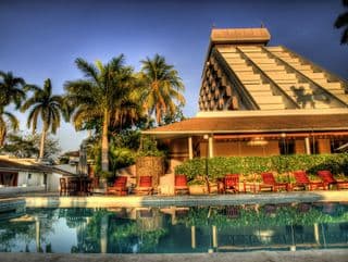 Pyramid-Style Hotel by the Tropical Pool