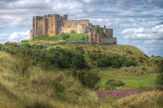 Medieval Bamburgh Castle atop the Dunes