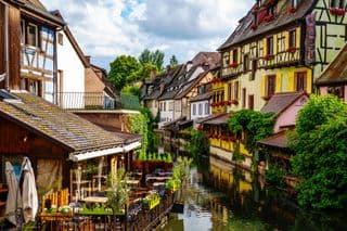 Colorful Half-Timbered Houses Along the River in Petite Venise, Colmar, France
