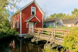 Rustic Red Cottage by the Creek