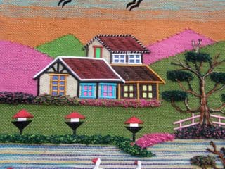 Colorful Embroidered Village Scene