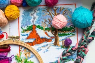 Embroidered Winter Cabin Scene