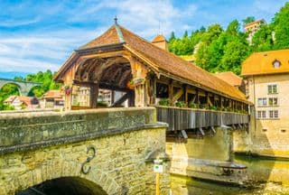 Historic Covered Wooden Bridge in Fribourg, Switzerland