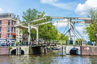 Historic Moving Bridge Over Canal in Amsterdam