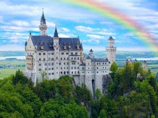 Neuschwanstein Castle under Rainbow in the Bavarian Alps