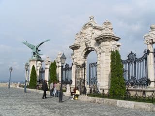 Eagle Statue at Ornate Gates Entrance