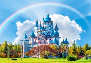Enchanted Fairy Tale Castle under Rainbow Sky