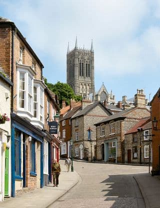 Historic Streets of Lincoln with Gothic Cathedral in the Background