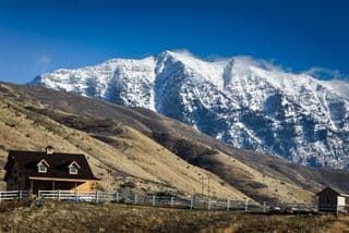 Snow-Capped Mountain View Barn