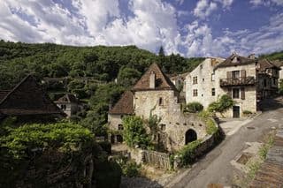 Stone Houses Nestled Amongst the Forest in Saint-Cirq-Lapopie, Southwestern France