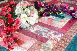 Vintage Silk Flower Bouquet on Patchwork Quilt