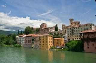 Colorful Buildings Along the River in Bassano del Grappa