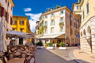 Verona's Street Café Basks under the Italian Sun