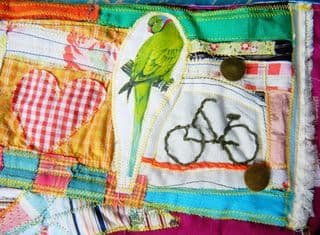 Patchwork Quilt with Bicycle and Parrot