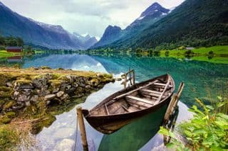 Traditional Boat Afloat in Lake Loen, Norway