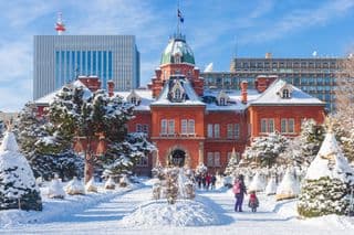 Snow-covered Sapporo Clock Tower in Winter Wonderland