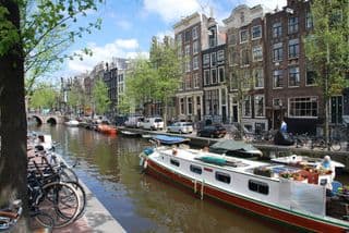 Amsterdam's Iconic Canal Houses and Boat Lifestyle