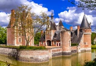 Medieval Castle by the Moat in Springtime