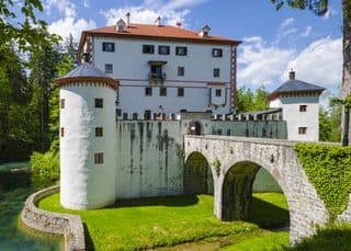 Medieval Castle Sneznik with Stone Bridge in Slovenia