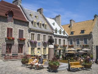 Historic Quebec City Square Basks in Summer Sunlight