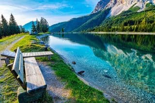 Reflective Alpine Lake at Ehrwalder Almsee, Austria