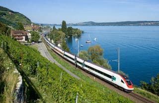 High-Speed Train Along the Swiss Lakefront