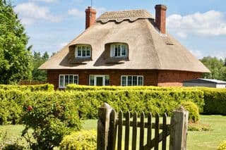 Traditional English Thatched Roof Cottage