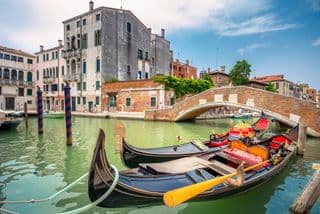 Gondolas moored at Ponte della Paglia in Venice