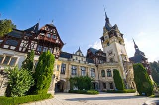 Regal Peleș Castle amidst the Carpathian Forest