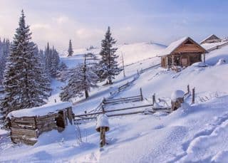 Snow-covered Carpathian Cabin