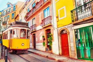 Lisbon's Funicular Climbing Through Colorful Buildings