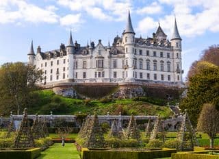 Elegant Dunrobin Castle amidst Spring's Splendor