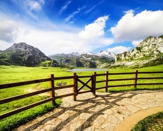 Enclosed Meadows Leading to Lake Ercina in Asturias, Spain
