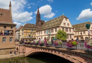 Strasbourg's Ponts Couverts Under Blue Skies