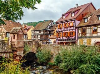 Ancient Stone Bridge Over Calm Waters