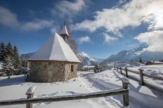 Snow-covered Chapel in the Austrian Alps